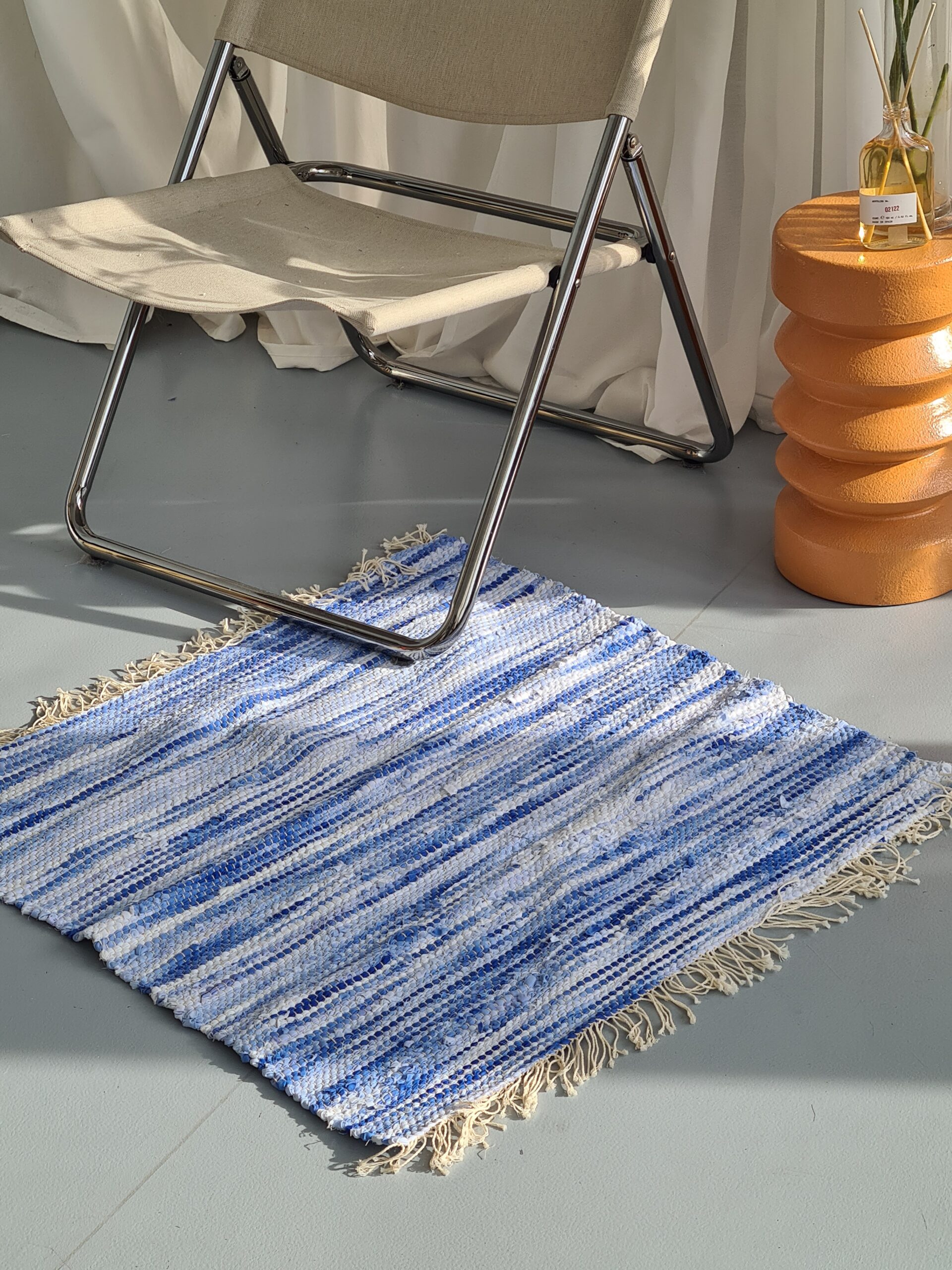 HAND WOVEN RUG MADE WITH UPCYCLED MATERIALS (81x77.5)